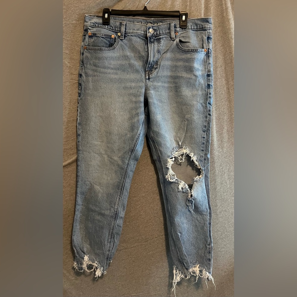 Distressed Blue Denim Jeans